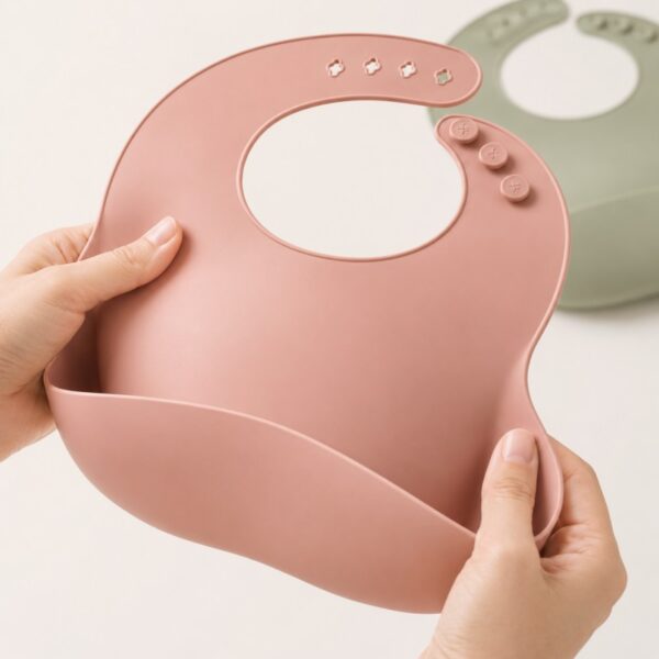 Soft silicone baby bib with adjustable neck button