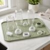 Silicone drying mat bottle support structure