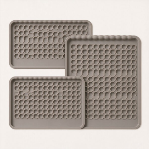 Custom silicone cat litter mats shown in different size options with a consistent surface pattern