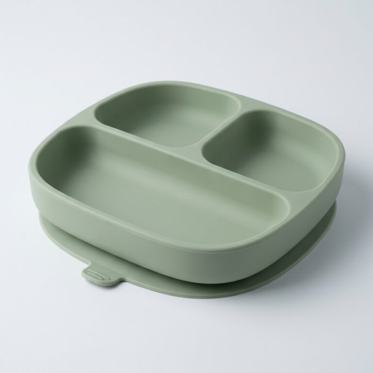 Three-compartment silicone baby suction plate with an integrated suction base and release tab