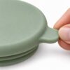 Integrated rounded pull tab on a flexible silicone pet can cover