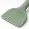 Rounded flexible scraper head of a one-piece silicone pet food spatula