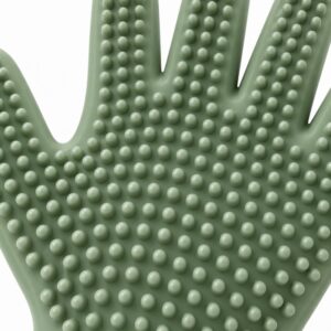 Rounded flexible silicone grooming nubs on the palm of a pet grooming glove